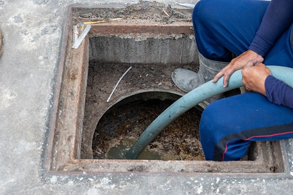 foul odors, slow drainage, and visible grease buildup are common indicators that grease trap pumping is necessary